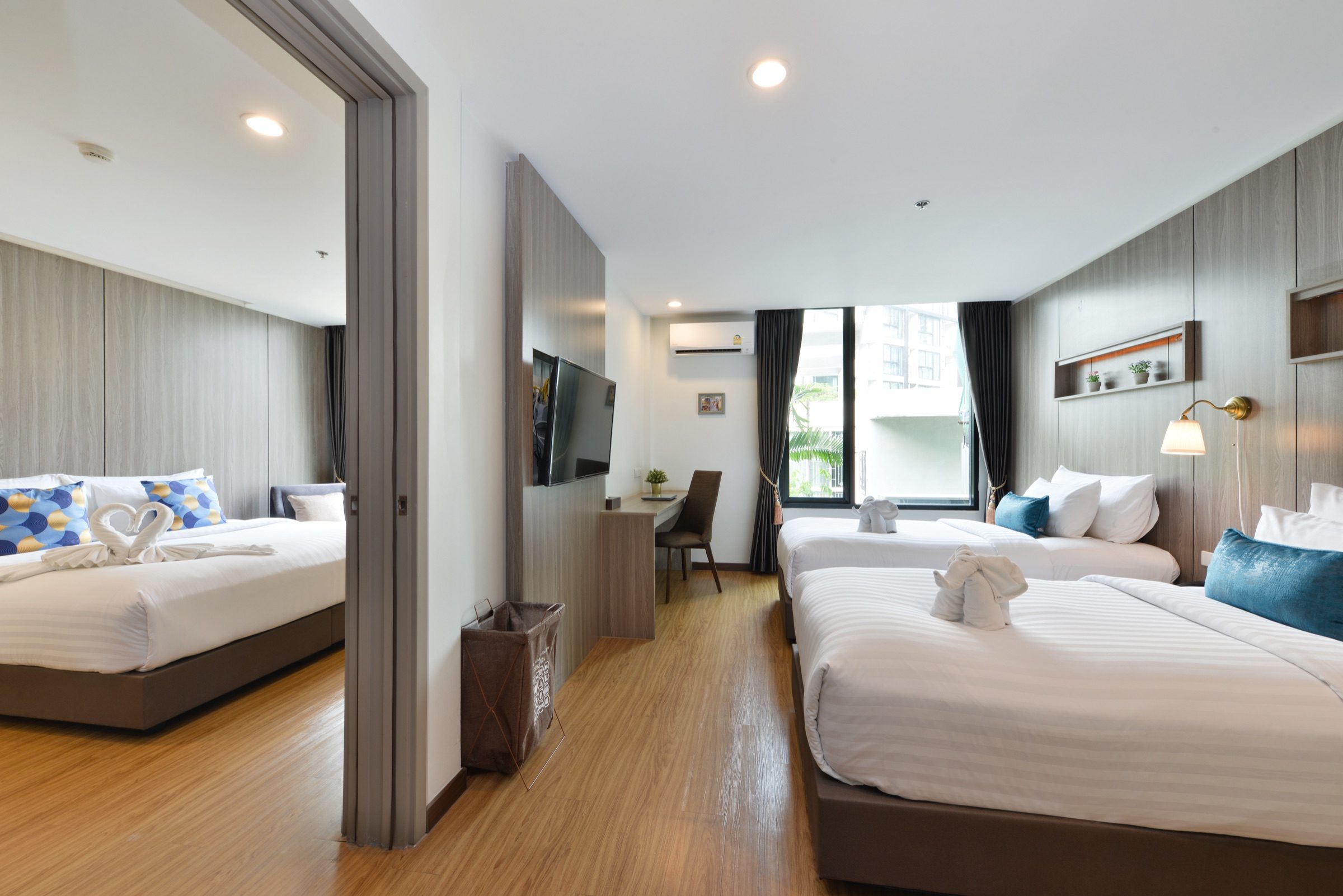 A connecting pair of rooms at StayAt Bedever, a Deluxe King and a Deluxe Twin with the connecting door open